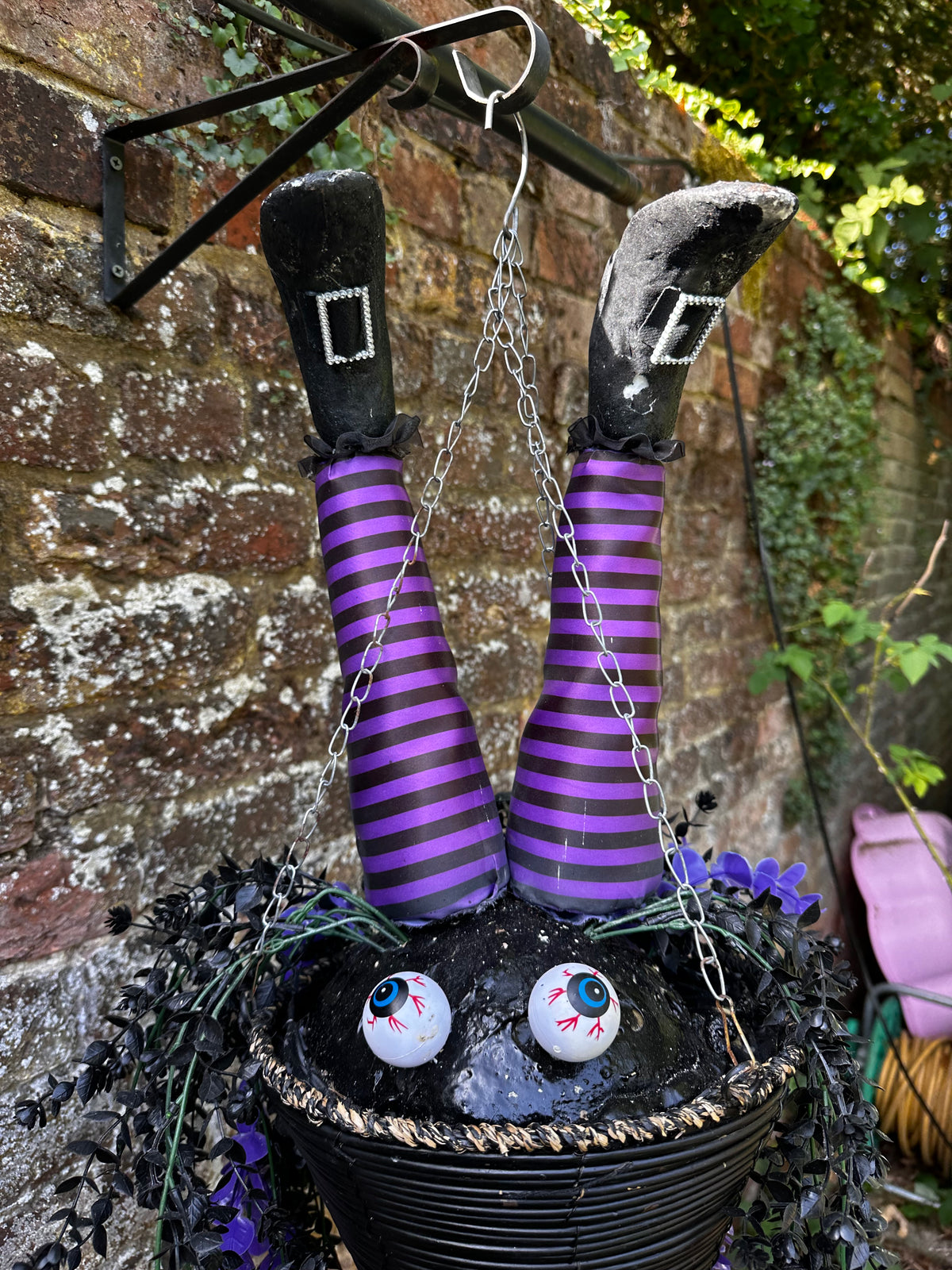 Witch Halloween hanging basket. Outside decor