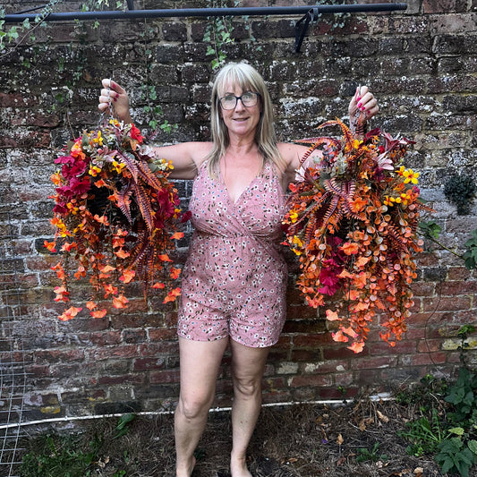 Pair of Brigitte small hanging baskets. Autumnal colours.