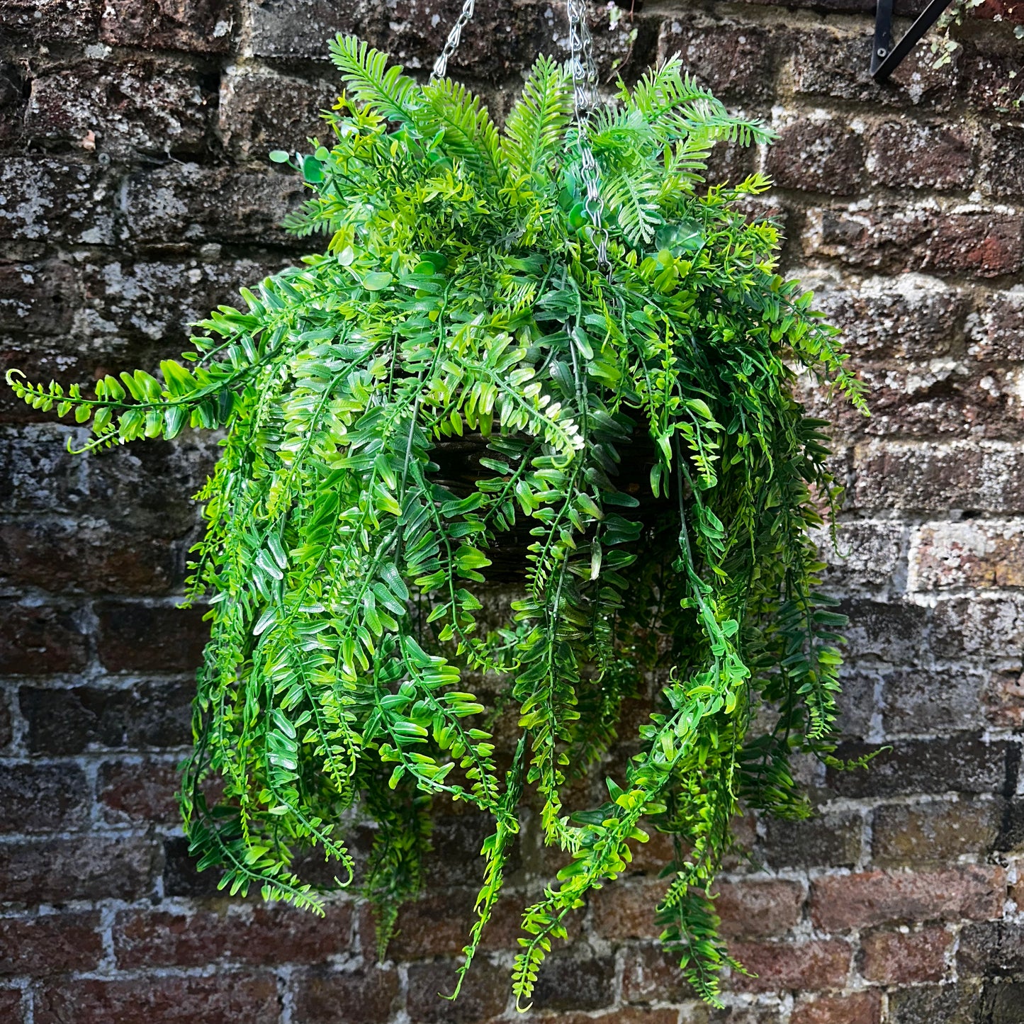 The Giselle natural foliage hanging basket ( shown on right of video)