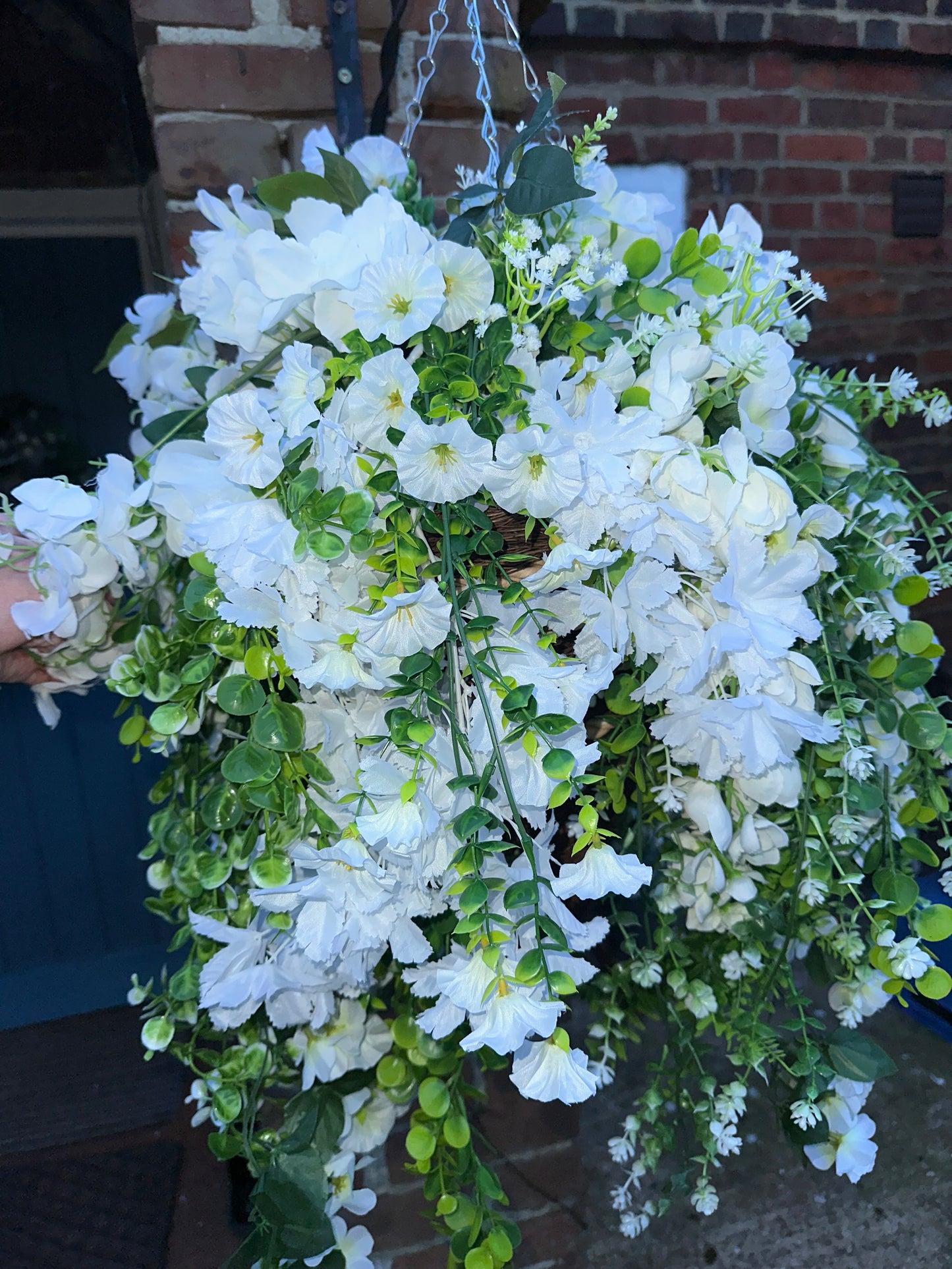 White faux flowers/ foliage full cone hanging baskets.